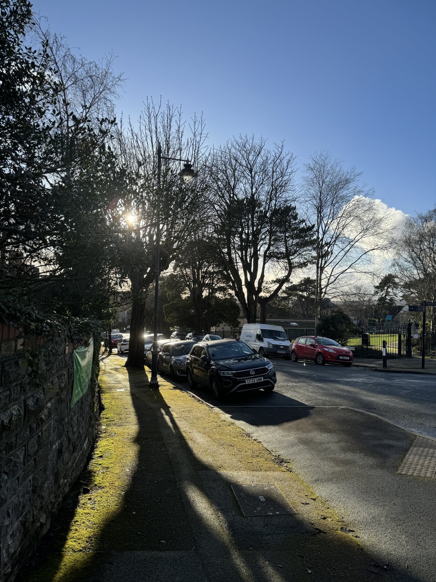 Winter sunlight on the street beside Belle Vue Park, Penarth