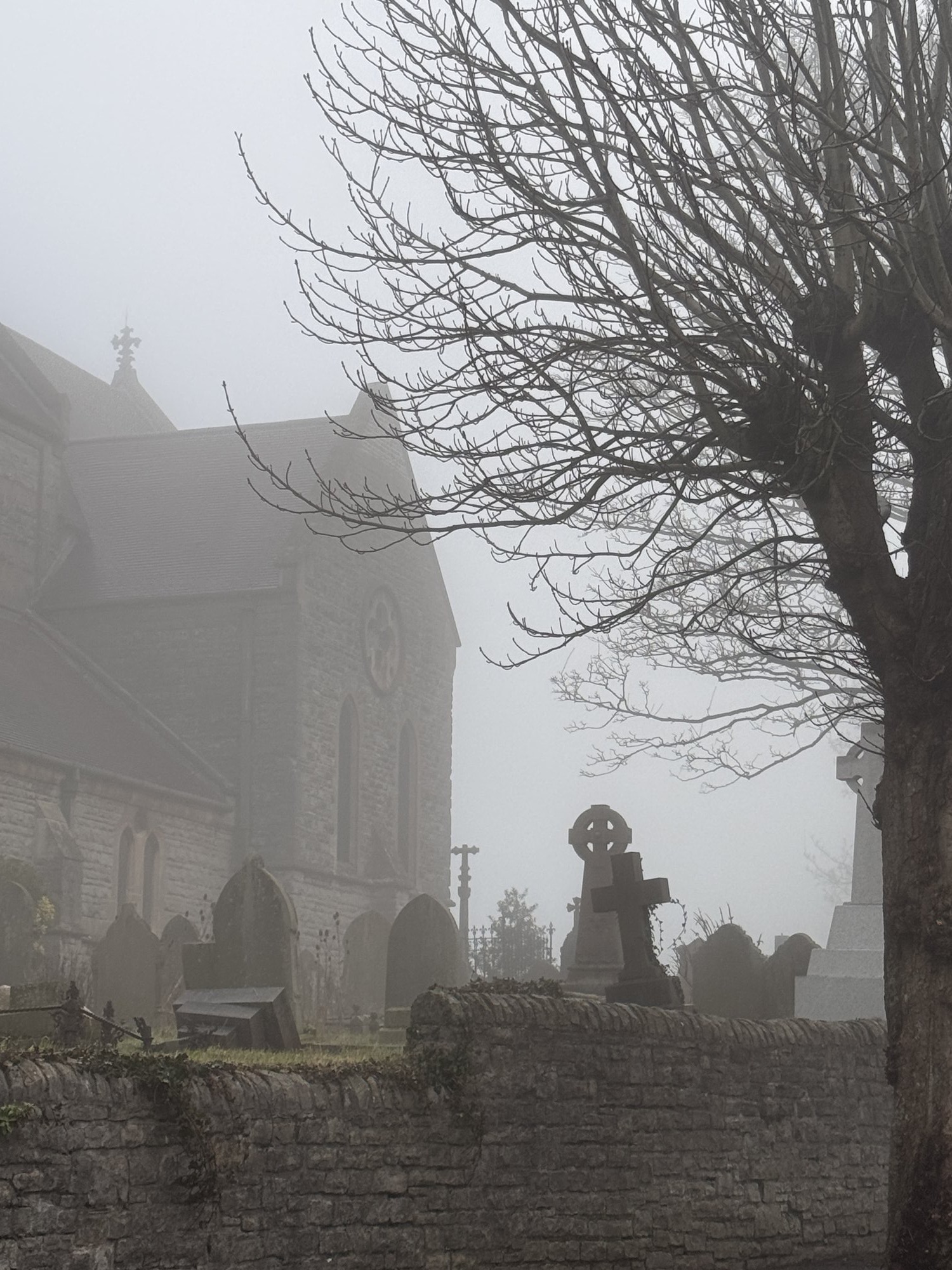 St Augustine’s Church and churchyard in the mist, Penarth