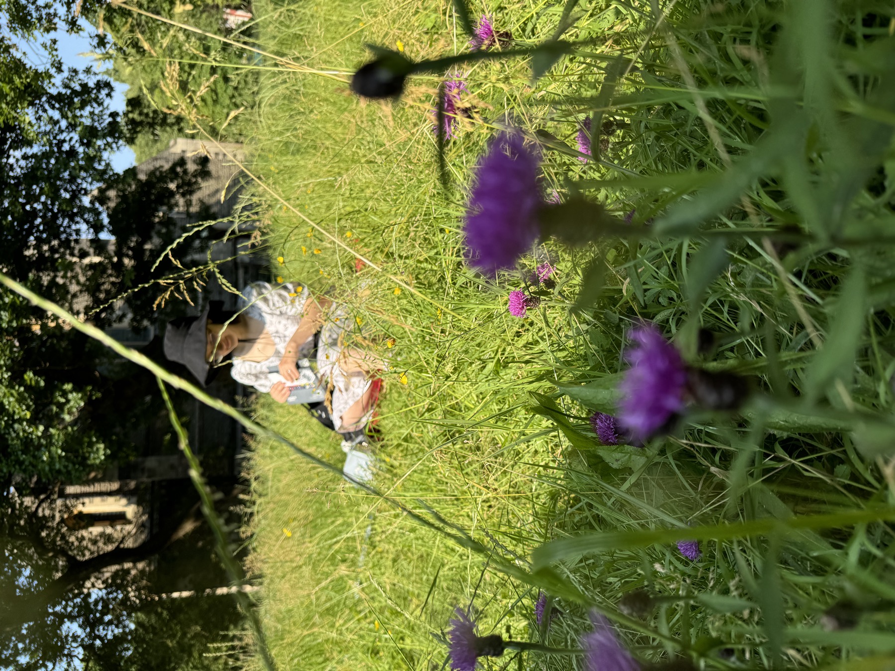 Sketching in the grass at Victoria Square Penarth
